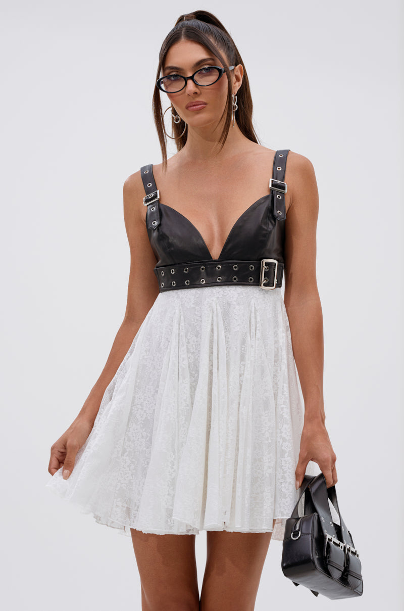 EDGY WITH A BOW ON TOP MINI DRESS